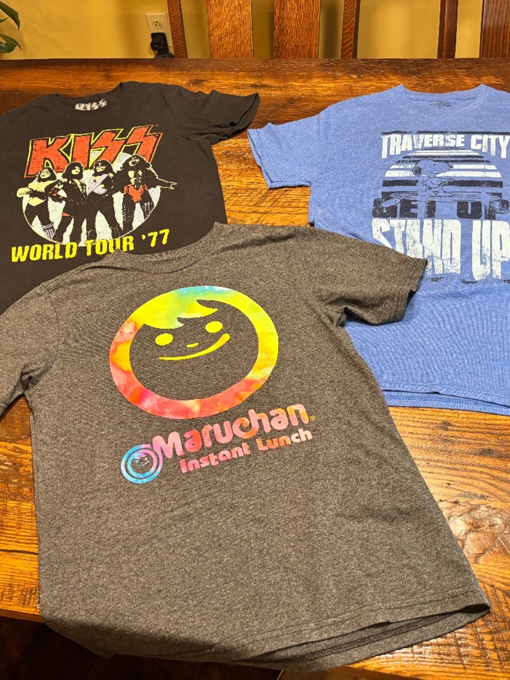 4 (see all photos) Graphic Tshirts in excellent condition youth xl-adult small.